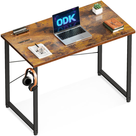 ODK brauner Schreibtisch 80 x 40 cm, minimalistisches Design, stabiler Stahlrahmen, im Homeoffice aufgestellt.
